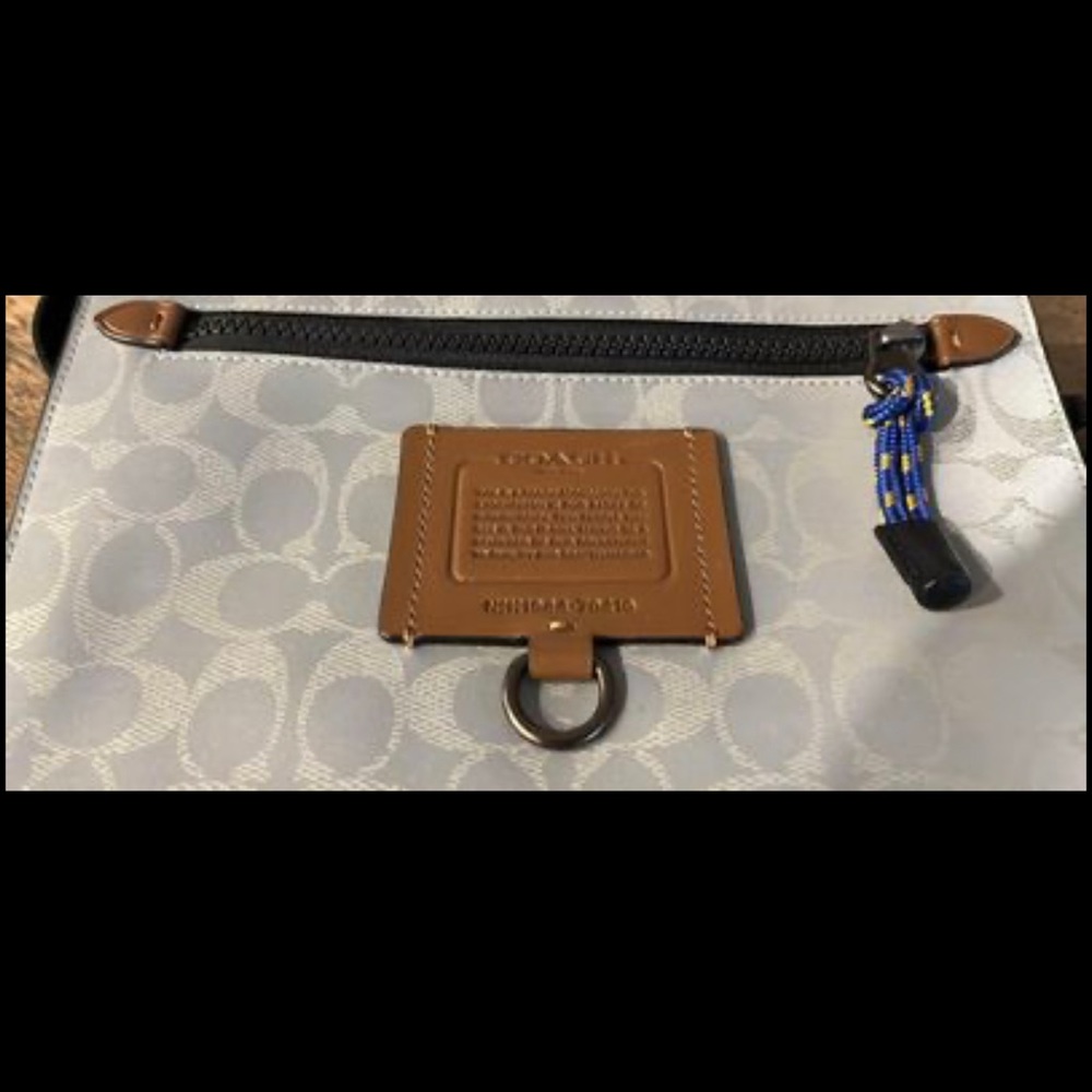 Coach Original
Good for events.Fashion.Somewhat reflectorized
Fixed price.
